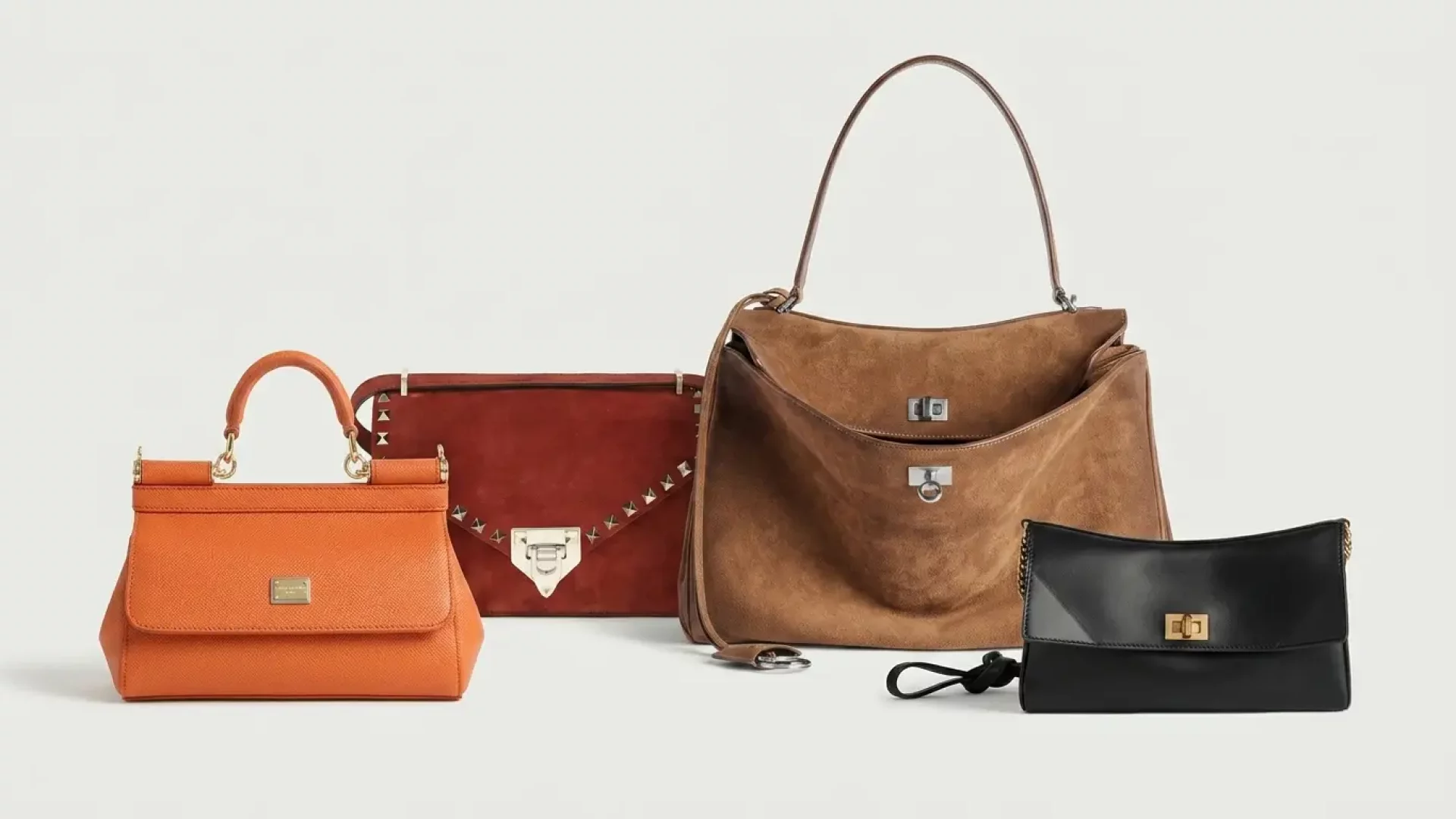 Valentino Rockstud clutch, Balenciaga Rodeo suede bag, Dolce&Gabbana Sicily in orange and black, 2026